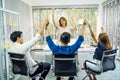 Portrait Of Happy Successful Business Group at office,.Business team celebrating a triumph with arms up, Royalty Free Stock Photo