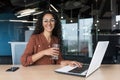 Portrait of happy and successful business woman inside modern office building Royalty Free Stock Photo