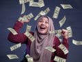 Young Woman Under Rain of Money Royalty Free Stock Photo