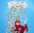 Young Woman Under Rain of Money Royalty Free Stock Photo
