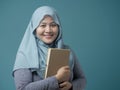 Happy Muslim Lady with Book