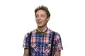 Portrait of happy teenage boy is looking up. Royalty Free Stock Photo