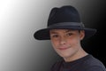 Teenage boy wearing  black fedora hat Royalty Free Stock Photo