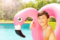 Boy with swim ring at the edge of swimming pool Royalty Free Stock Photo