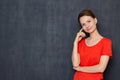 Portrait of happy thoughtful young woman imagining something in mind Royalty Free Stock Photo