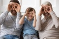 Portrait of happy three generations of men have fun Royalty Free Stock Photo