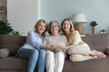 Portrait happy three generations women pose for family picture Royalty Free Stock Photo