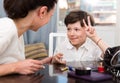 Happy tweenager chatting with mom Royalty Free Stock Photo