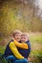 Portrait happy two brothers embracing in sunny day. Royalty Free Stock Photo
