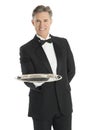 Portrait Of Happy Waiter Carrying Serving Tray