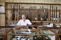 Portrait of a happy weapon shop owner Royalty Free Stock Photo