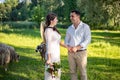 Portrait of a happy wedding couple on their wedding day. Beautiful newlyweds are dancing on a wedding walk on a warm Royalty Free Stock Photo