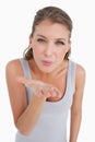 Portrait of a happy woman blowing a kiss Royalty Free Stock Photo