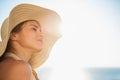 Portrait of happy woman enjoying sunshine