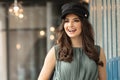 Portrait of happy woman in french style hat