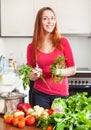 Portrait of happy woman with fresh vegetables Royalty Free Stock Photo