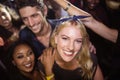 Portrait of happy woman with friends at nightclub Royalty Free Stock Photo