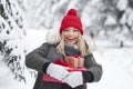 Happy woman holding stack of Christmas presents Royalty Free Stock Photo