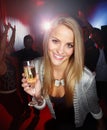 Portrait of happy woman, nightclub and drinks at party, celebration and new years evening in Russia. Young girl, night