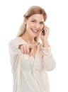 Portrait of happy woman, phone call or pointing to you with smile on white background in studio. Talking, hand gesture Royalty Free Stock Photo