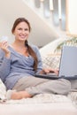 Portrait of a happy woman shopping online Royalty Free Stock Photo