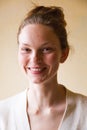 Portrait of happy woman with topknot on her head Royalty Free Stock Photo