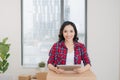 Portrait of happy woman using digital tablet during moving home Royalty Free Stock Photo