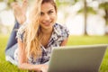 Portrait of happy woman using laptop Royalty Free Stock Photo