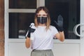 Portrait happy woman wile wearing a face shield for protection from cold and flu and viruses. Young woman with face mask