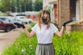 Portrait happy woman wile wearing a face shield for protection from cold and flu and viruses. Young woman with face mask