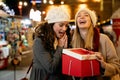 Portrait of happy women exchanging christmas presents. Holiday people christmas happiness concept Royalty Free Stock Photo