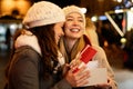 Portrait of happy women exchanging christmas presents. Holiday people christmas happiness concept Royalty Free Stock Photo