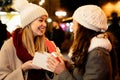 Portrait of happy women exchanging christmas presents. Holiday people christmas happiness concept Royalty Free Stock Photo