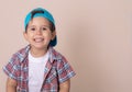 Portrait of happy 4 year little boy, isolated background.