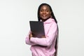 Portrait of happy young afro american woman using laptop computer isolated over white background Royalty Free Stock Photo