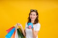 Portrait happy young asian woman holding piggybank saving money for shopping positive Royalty Free Stock Photo