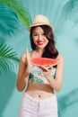 Portrait happy young asian woman is holding slice of watermelon Royalty Free Stock Photo