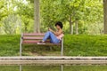 Portrait of a Happy young beautiful afro american woman sitting Royalty Free Stock Photo