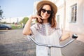 Portrait of happy young bicyclist riding in park Royalty Free Stock Photo