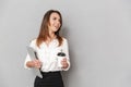 Portrait of a happy young business woman looking away Royalty Free Stock Photo