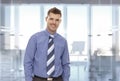 Portrait of happy young businessman at office Royalty Free Stock Photo