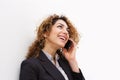 Happy young businesswoman talking on mobile phone Royalty Free Stock Photo