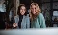 Portrait of happy young businesswomen working at office space Royalty Free Stock Photo