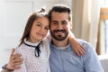 Portrait of happy dad and little daughter hug showing love Royalty Free Stock Photo