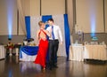 Portrait Of Happy Young Couple Dancing Tango at wedding banquet Royalty Free Stock Photo