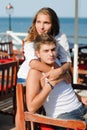 Happy young couple hugging each other at sea beach Royalty Free Stock Photo