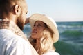 Portrait of happy young couple in love embracing each other on beach Royalty Free Stock Photo