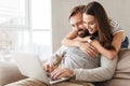 Portrait of a happy young couple using laptop computer Royalty Free Stock Photo