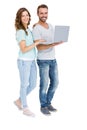 Portrait of happy young couple using laptop Royalty Free Stock Photo