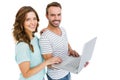 Portrait of happy young couple using laptop Royalty Free Stock Photo